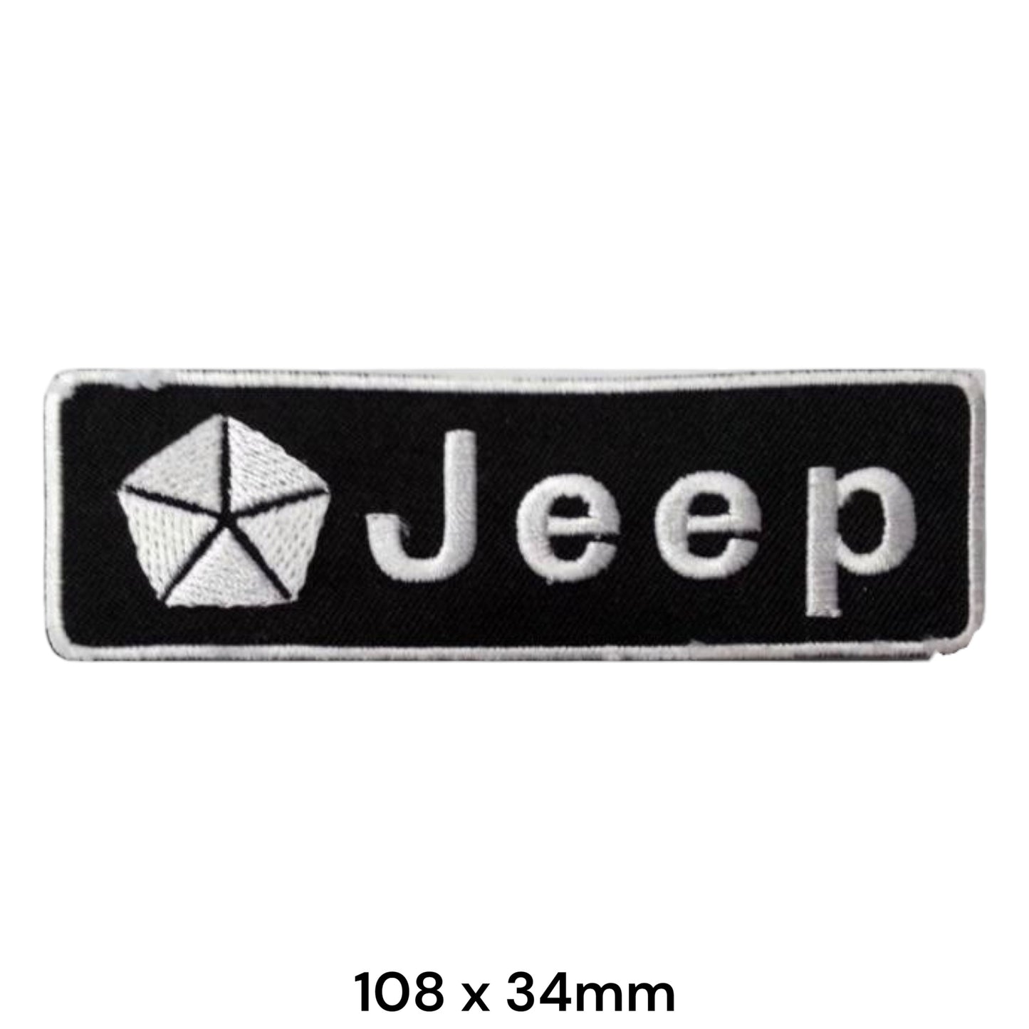 Jeep Pentastar Black & White Strip Embroidered Patch 108x34mm – black rectangular badge with white Pentastar logo and white Jeep script lettering, silver border