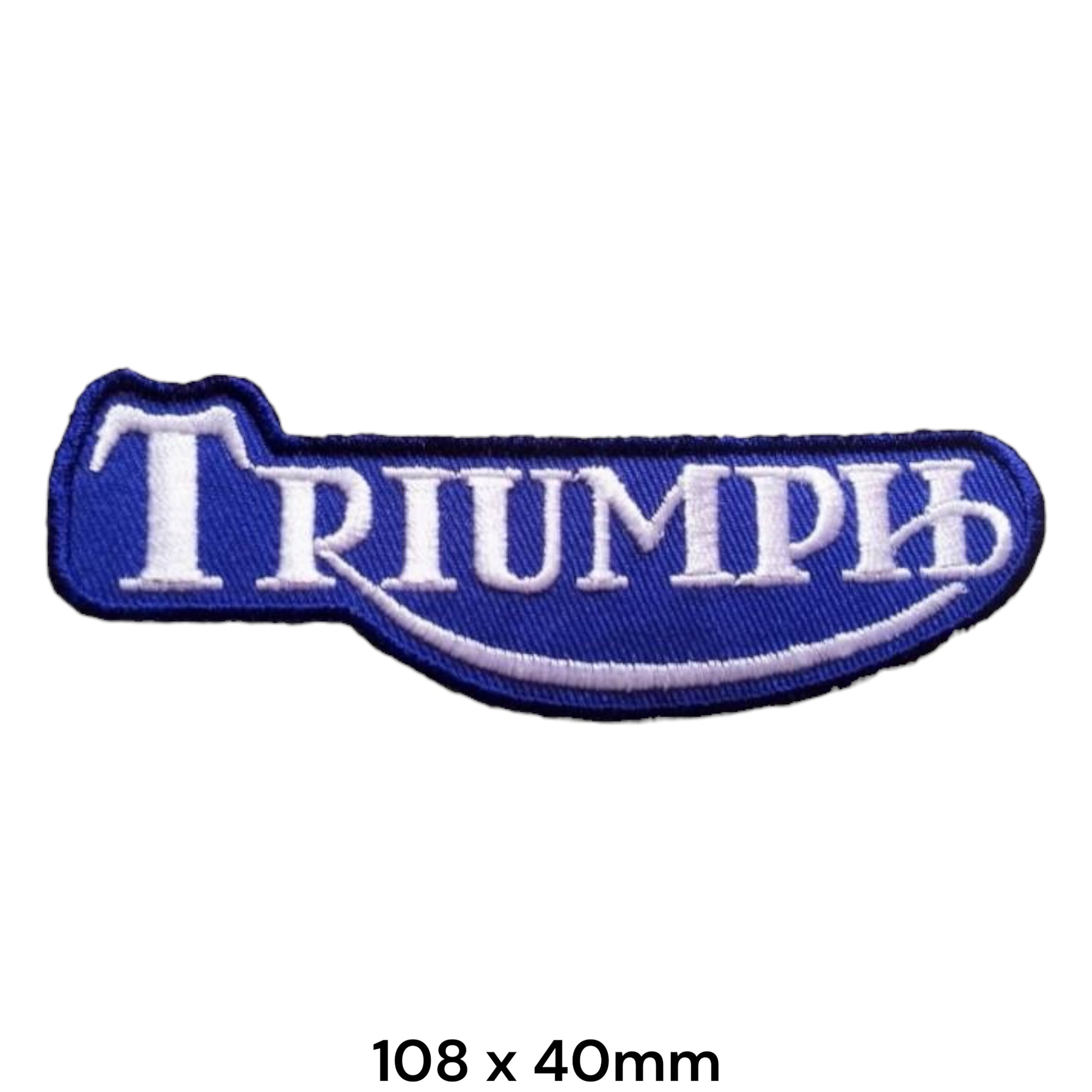 Triumph Blue Tank Badge Embroidered Patch 108x40mm – shaped royal blue tank-badge silhouette with bold white Triumph serif lettering, white swoosh underline and dark navy border