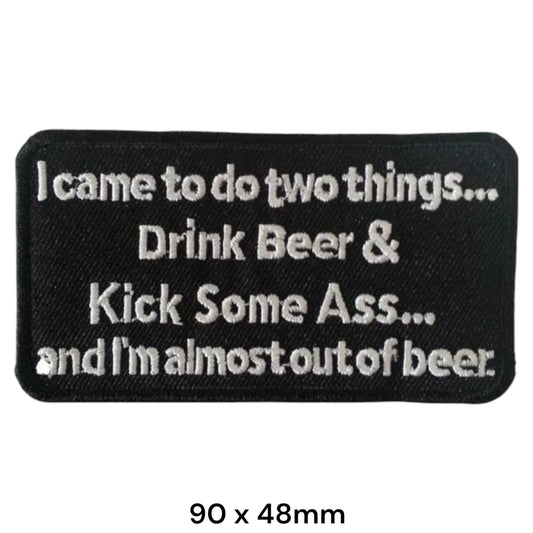 Drink Beer Kick Some Ass Funny Slogan Rectangular Embroidered Patch 90x48mm – Black & White/Silver
